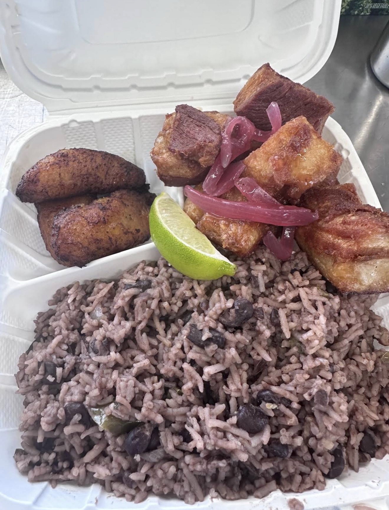 Masitas de puerco with congrí and sweet plantains